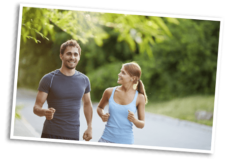 Young happy couple jogging