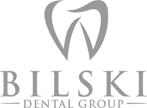 Bilski Dental Group Logo - Gray serif type with tooth icon on top