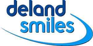 Deland Smiles Logo - Dark blue and bright blue sans-serif type with swoosh bottom right