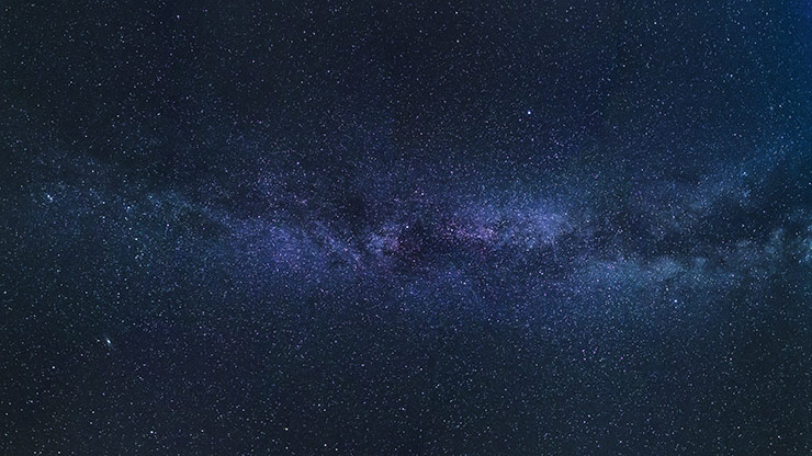 The sky at night showing many stars