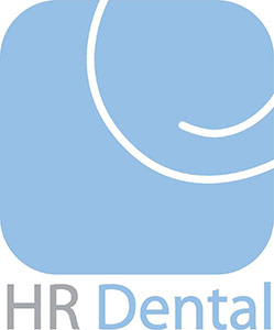 Hood River Dental Logo - Light gray and blue sans-serif type with rounded corner square and swirl inside above type