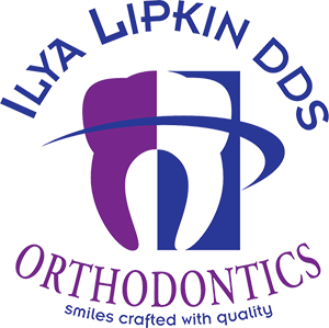 Ilya Lipkin DDS Logo - Dark blue sans-serif type and serif purple type with tooth icon in middle