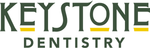 Keystone Dentistry Logo - Dark green and gold serif type
