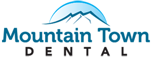 Mountain Town Dental Logo - Dark blue serif and black sans-serif type with mountain icon on top
