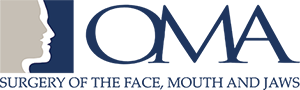 Oral and Maxillofacial Associates Logo - Dark blue serif type with faces icon to left