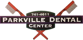 Parkville Dental Center Logo - White serif type on dark green and purple background with red criss-crossed toothbrushes in background