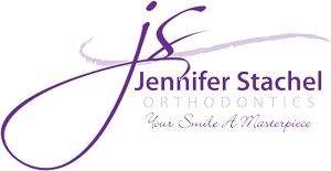 Stachel Orthodontics Logo - Purple script type and sans-serif type with with lavender accents