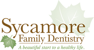 Sycamore Family Dentistry Logo - Brown and green serif type and green leaves at top and bottom